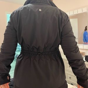 Lululemon zip up jacket in excellent condition. Zipper pockets,cinched waist